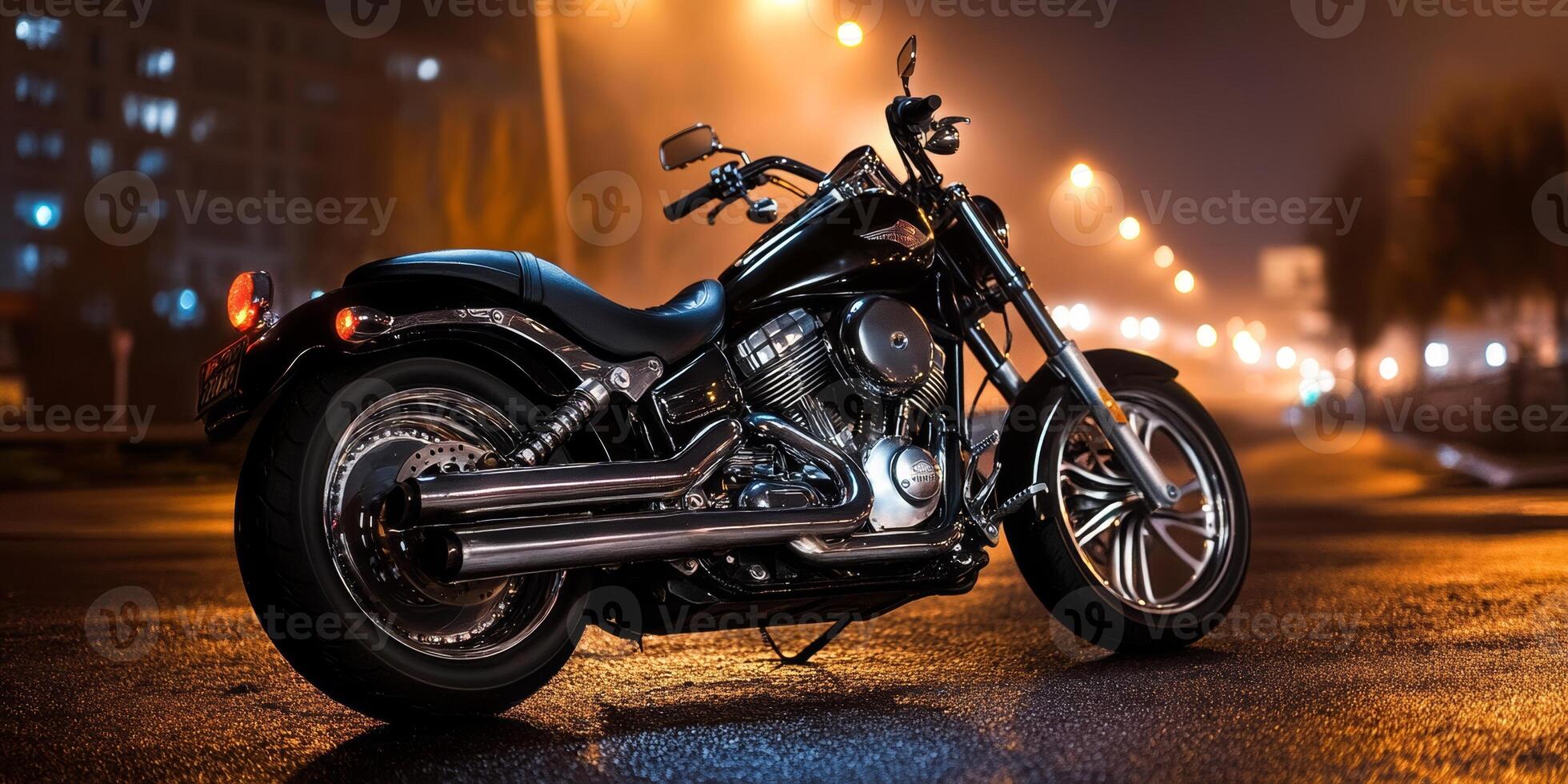Nighttime motorcycle parked on a wet street illuminated by streetlights with a vibrant urban backdrop photo