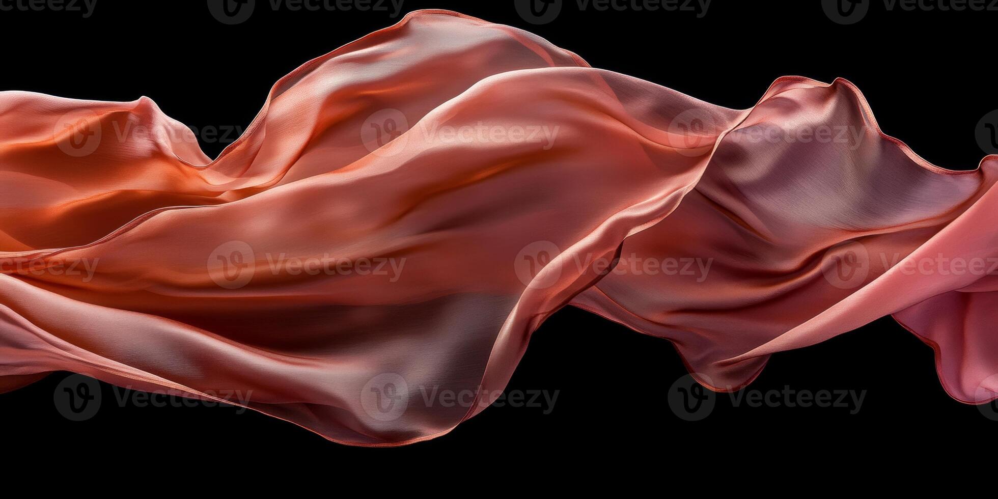 Elegant interplay of pink and red silk fabric cascading against a dark background captures grace and beauty in a timeless display photo