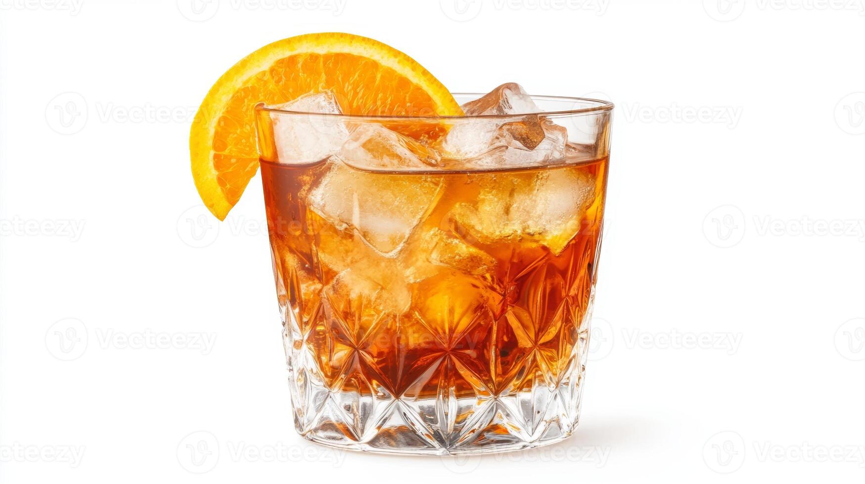 Refreshing orange cocktail garnished with a slice of fruit served in a crystal glass filled with ice photo