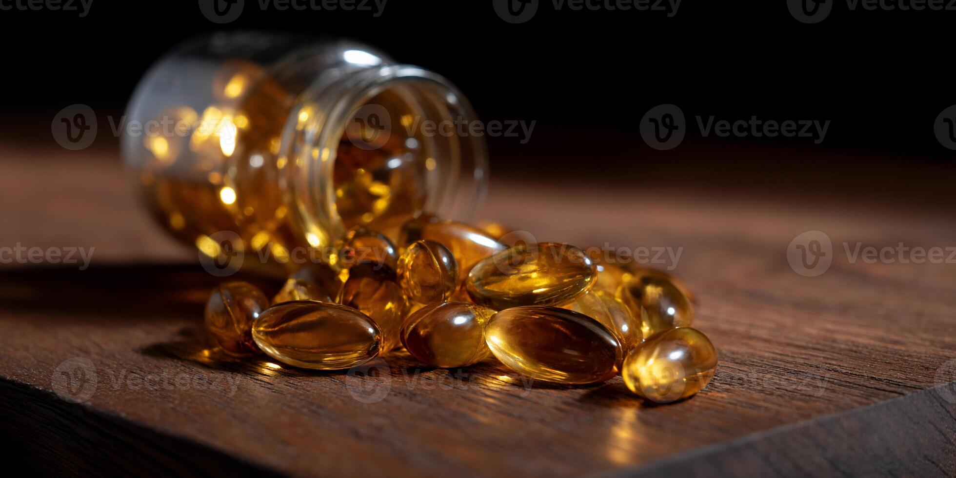 A jar of fish oil on a wooden table photo