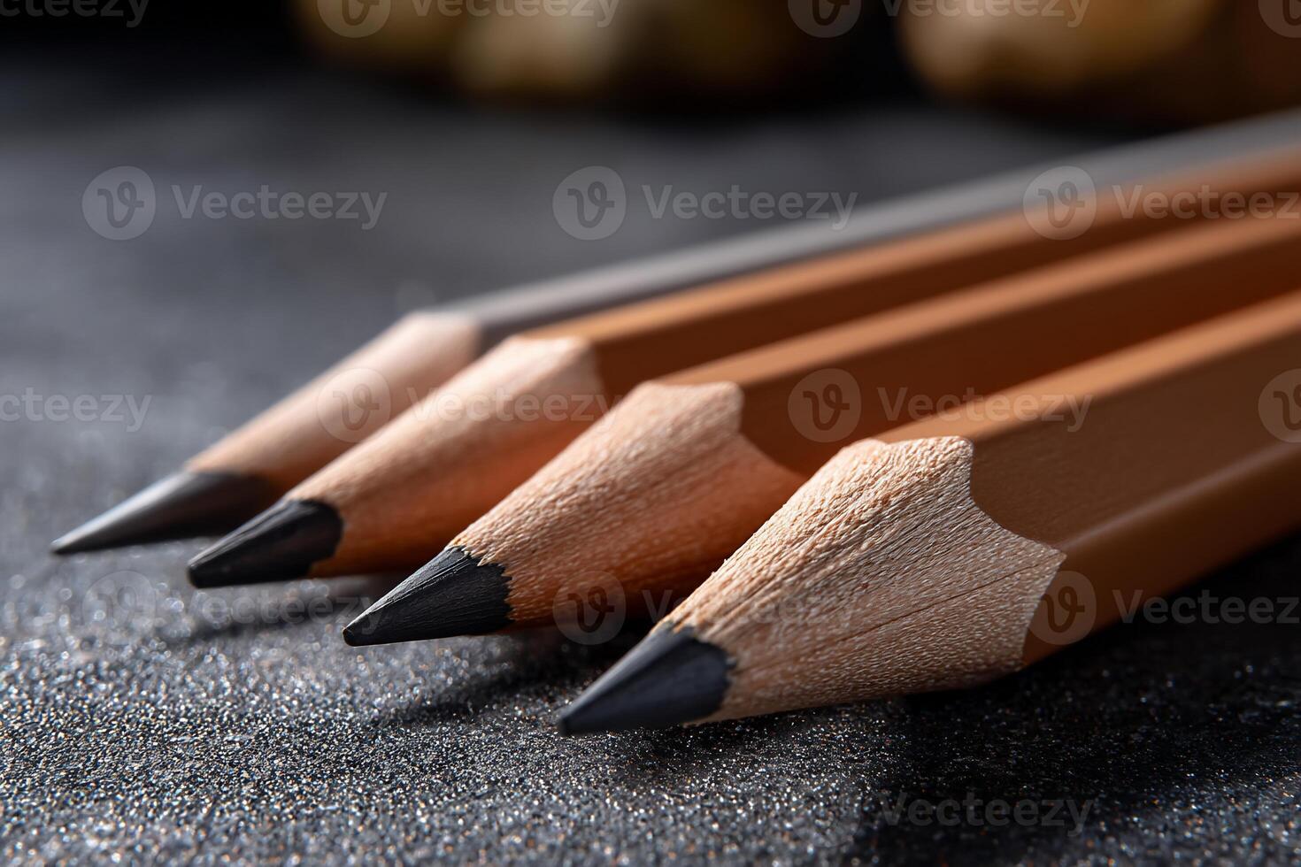 Three pencils on a table photo