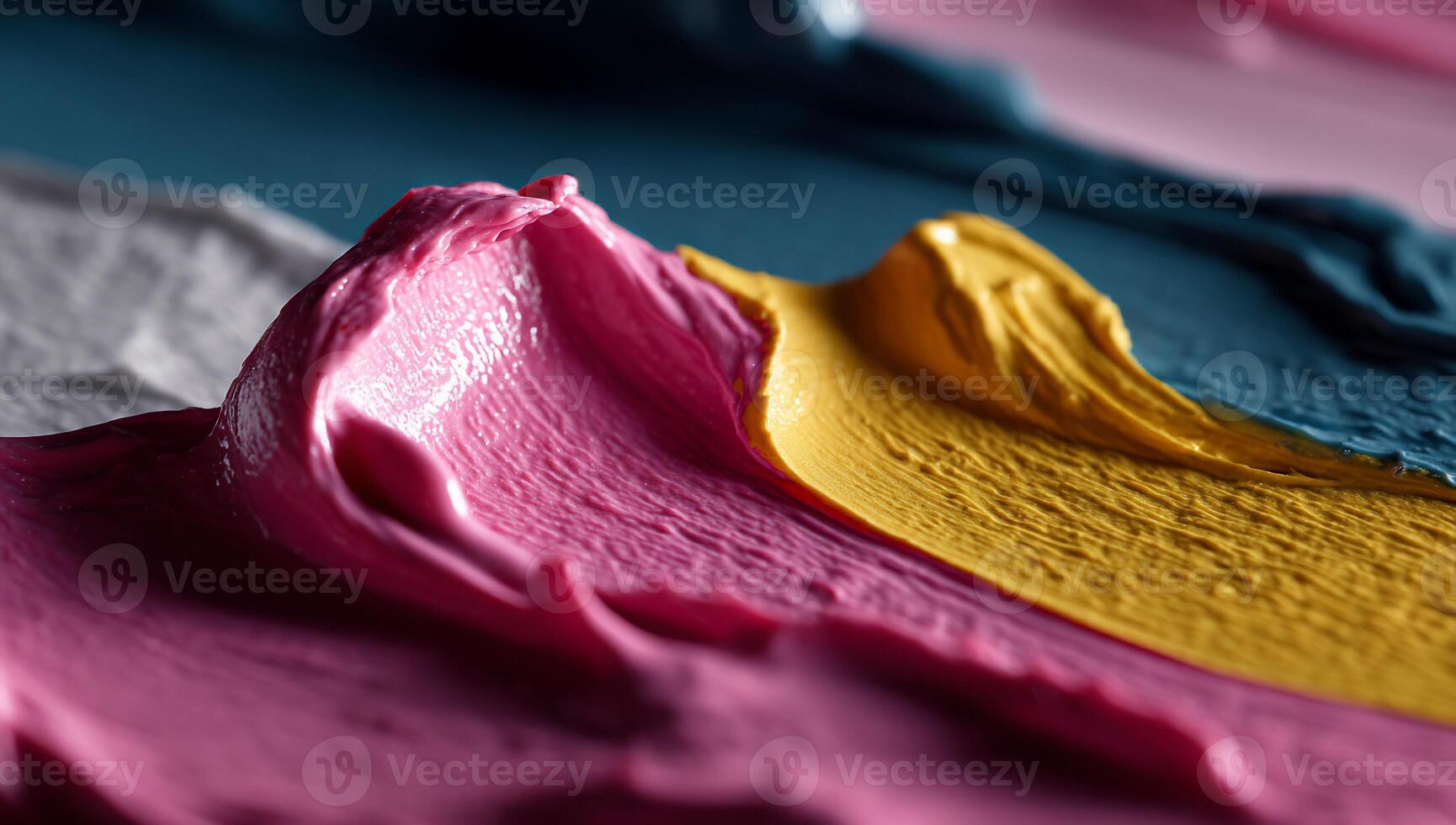 Close-up view of vibrant, textured paint strokes in various hues photo