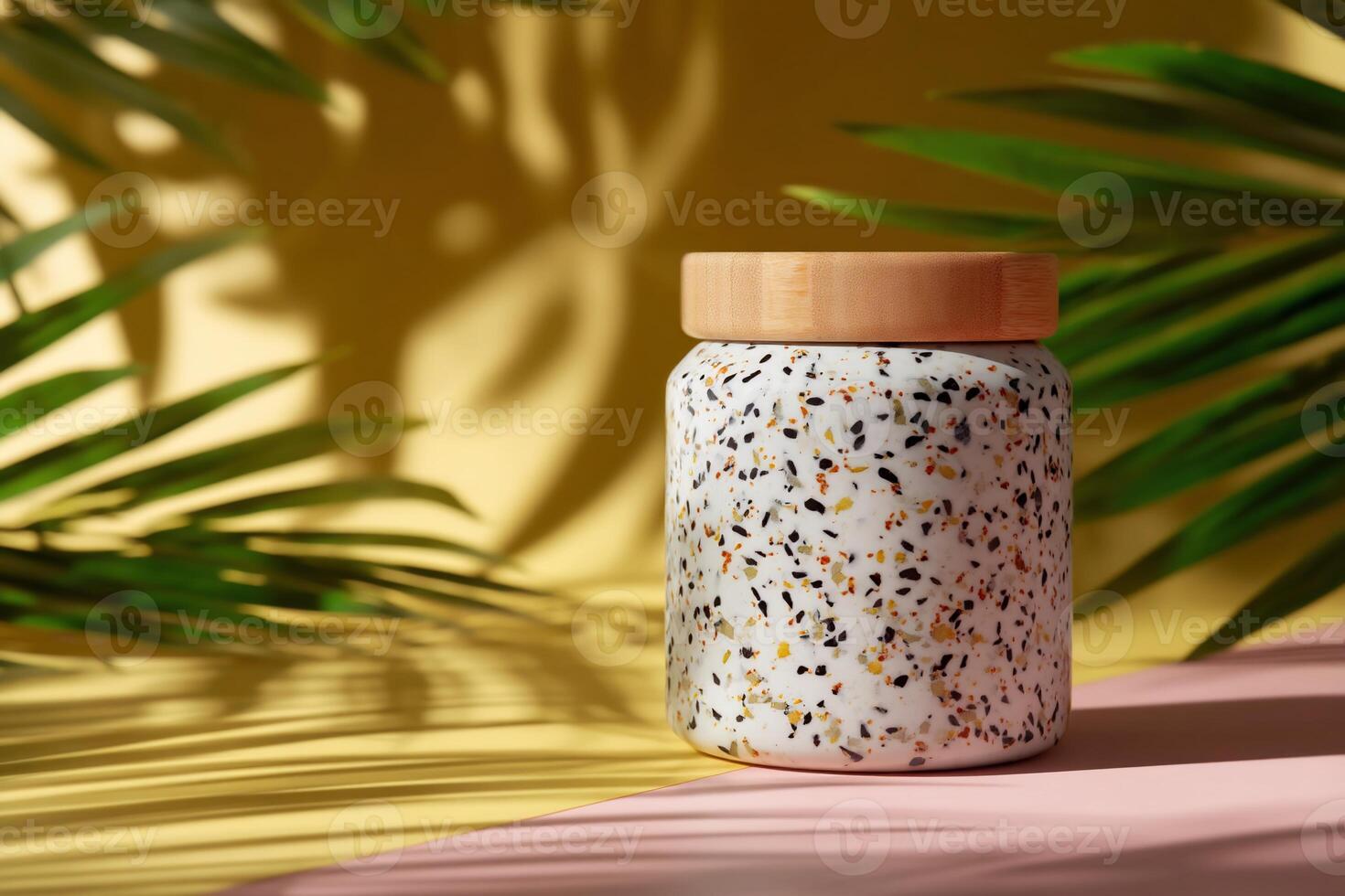 A decorative jar, terrazzo design, on pastel background with tropical leaves photo