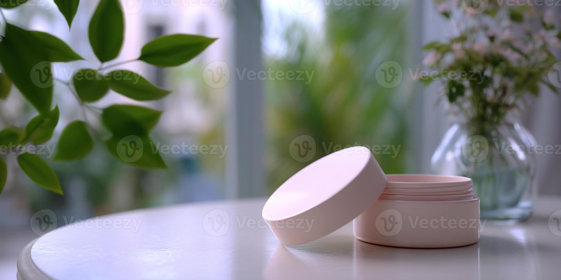 Light pink cosmetic container on white surface, blurred nature background photo