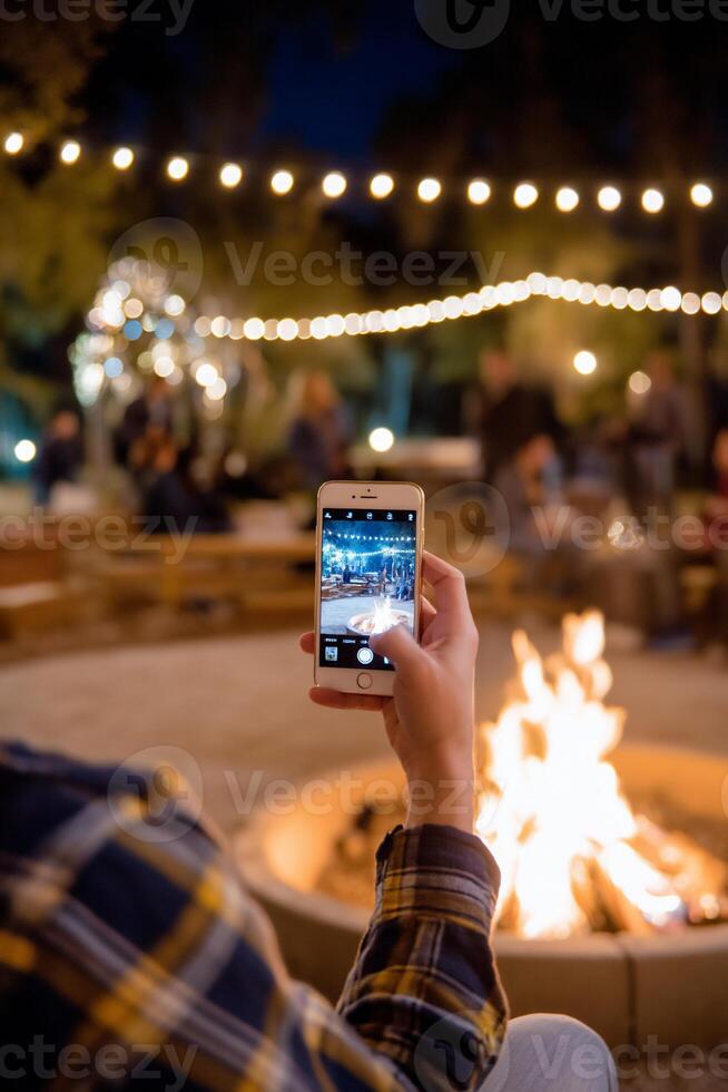 Nighttime outdoor scene, smartphone photo, campfire photo
