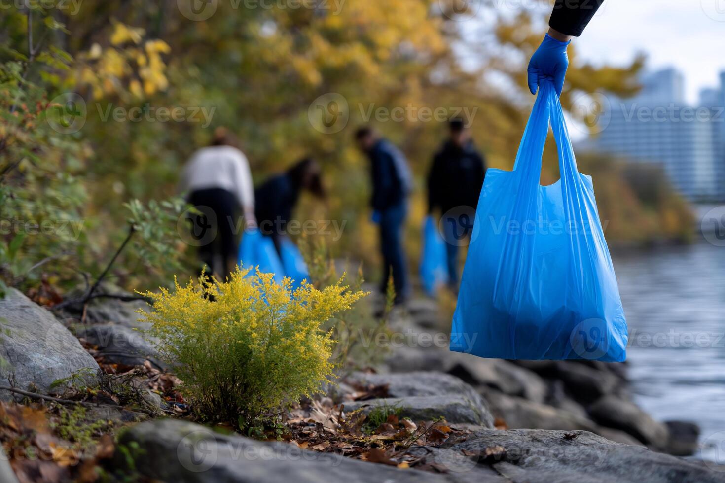 Volunteer group cleans riverbank debris photo