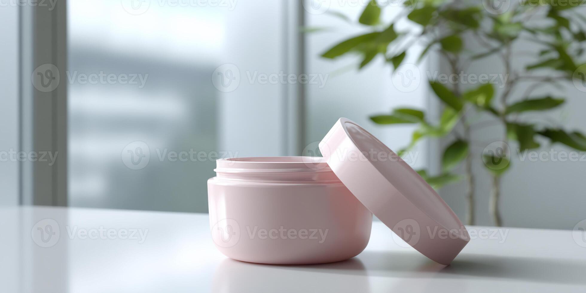 A pink jar with a lid sitting on a table photo