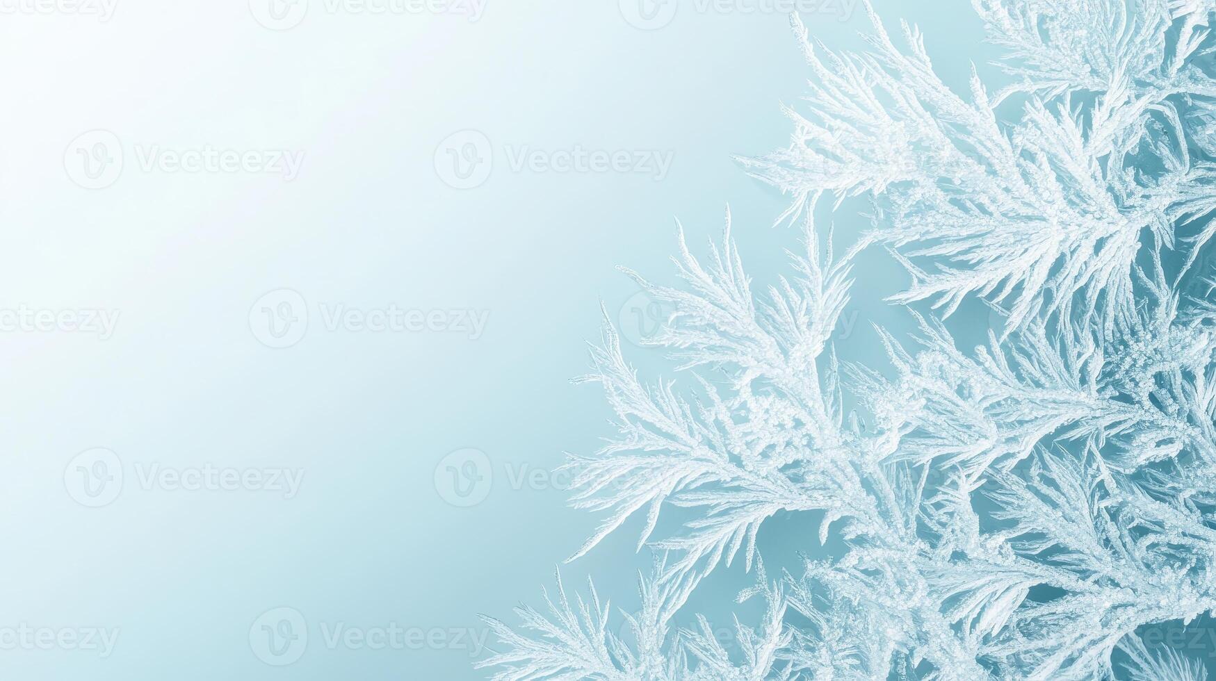 Frozen patterns form intricate ice crystals. Delicate frost flowers bloom on a window. Light blue background shines through winter art. photo