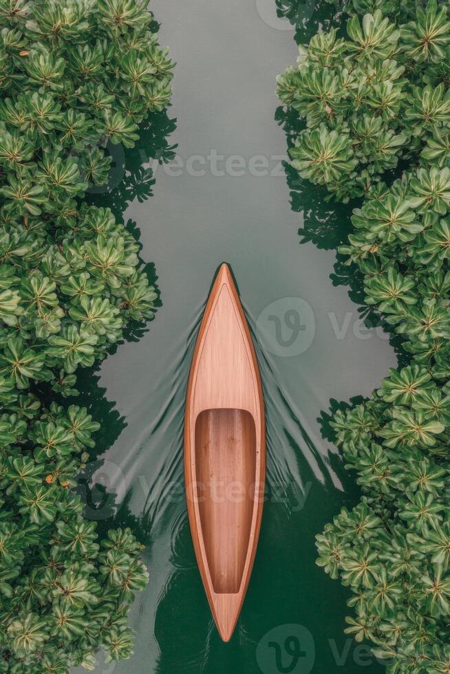A wooden canoe glides through serene waters of a tropical jungle, framed by vibrant greenery and a peaceful atmosphere, inviting exploration and adventure photo
