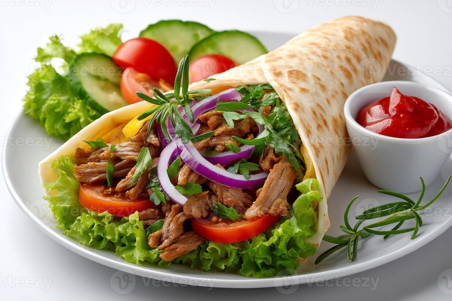 Tortilla wrap with beef, vegetables and ketchup being served on white plate photo