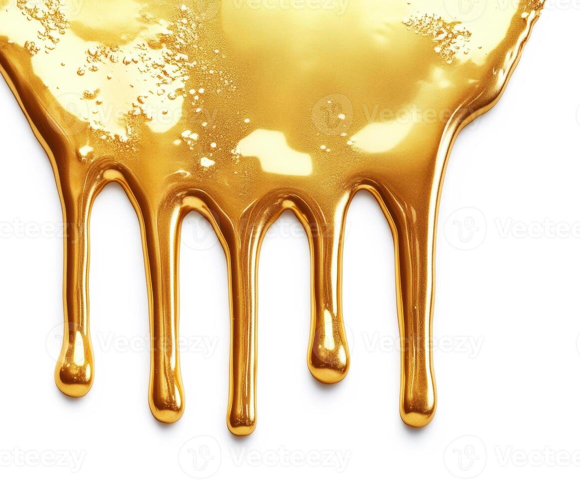 Dripping golden liquid on a white background creates a striking visual photo