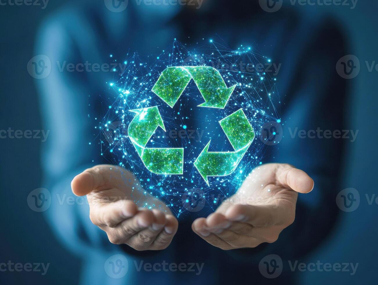 Hands holding glowing green recycling symbol in digital format photo