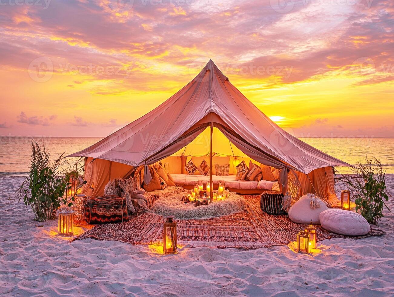 Relaxing beach tent with warm glow during sunset photo