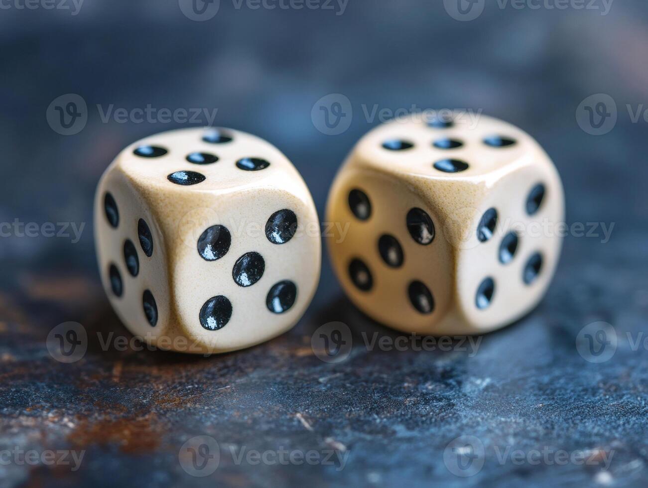 Two vintage dice resting on a dark surface during a game night photo