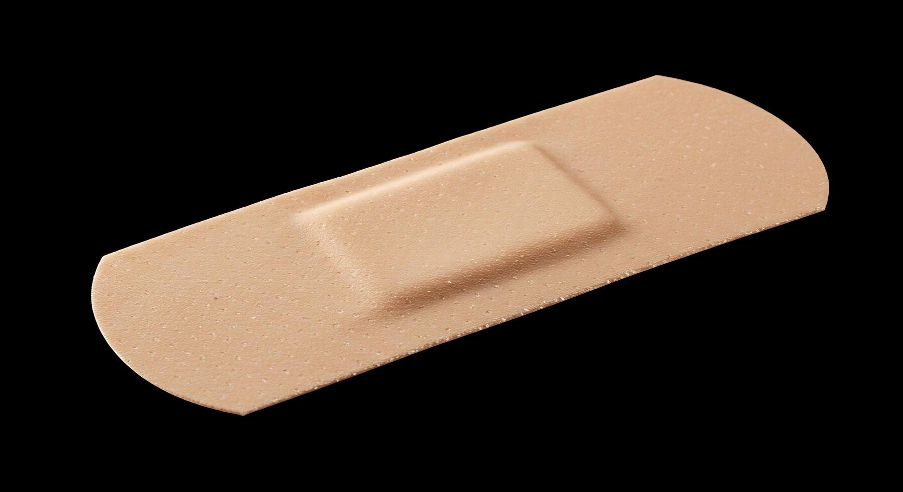 A bandage with a piece of adhesive on it photo