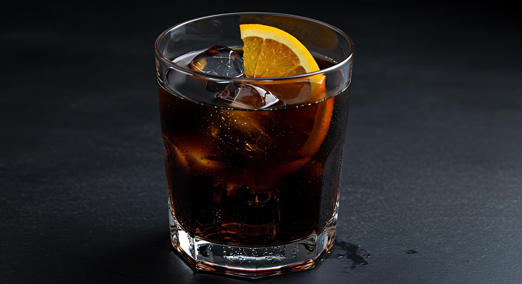 A glass of iced tea with a slice of orange photo
