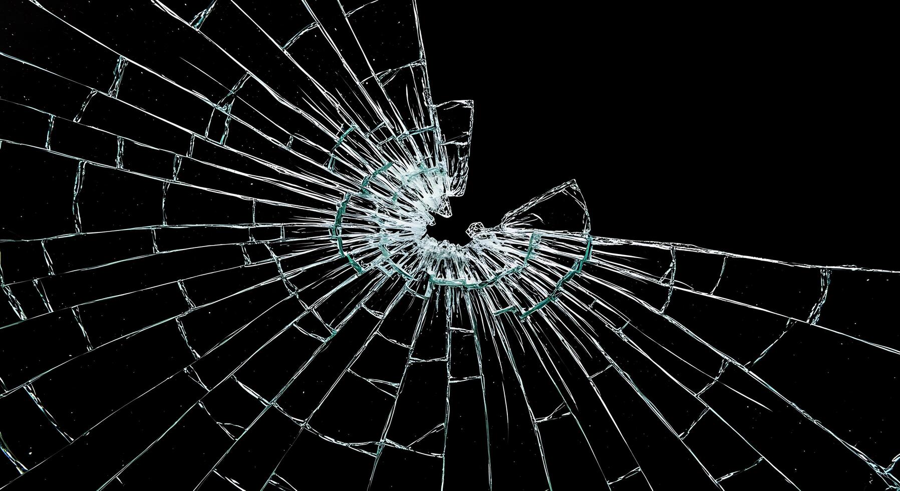 Broken glass on a black background photo
