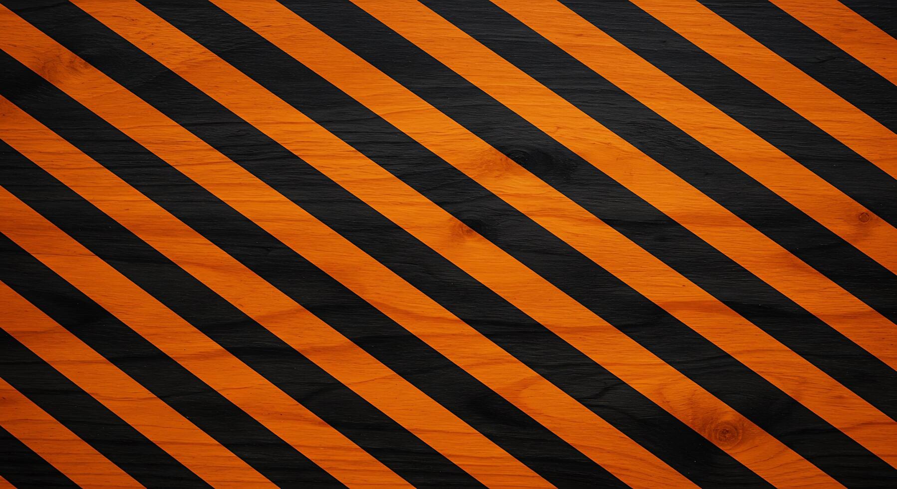 A black and orange striped background with a warning sign photo