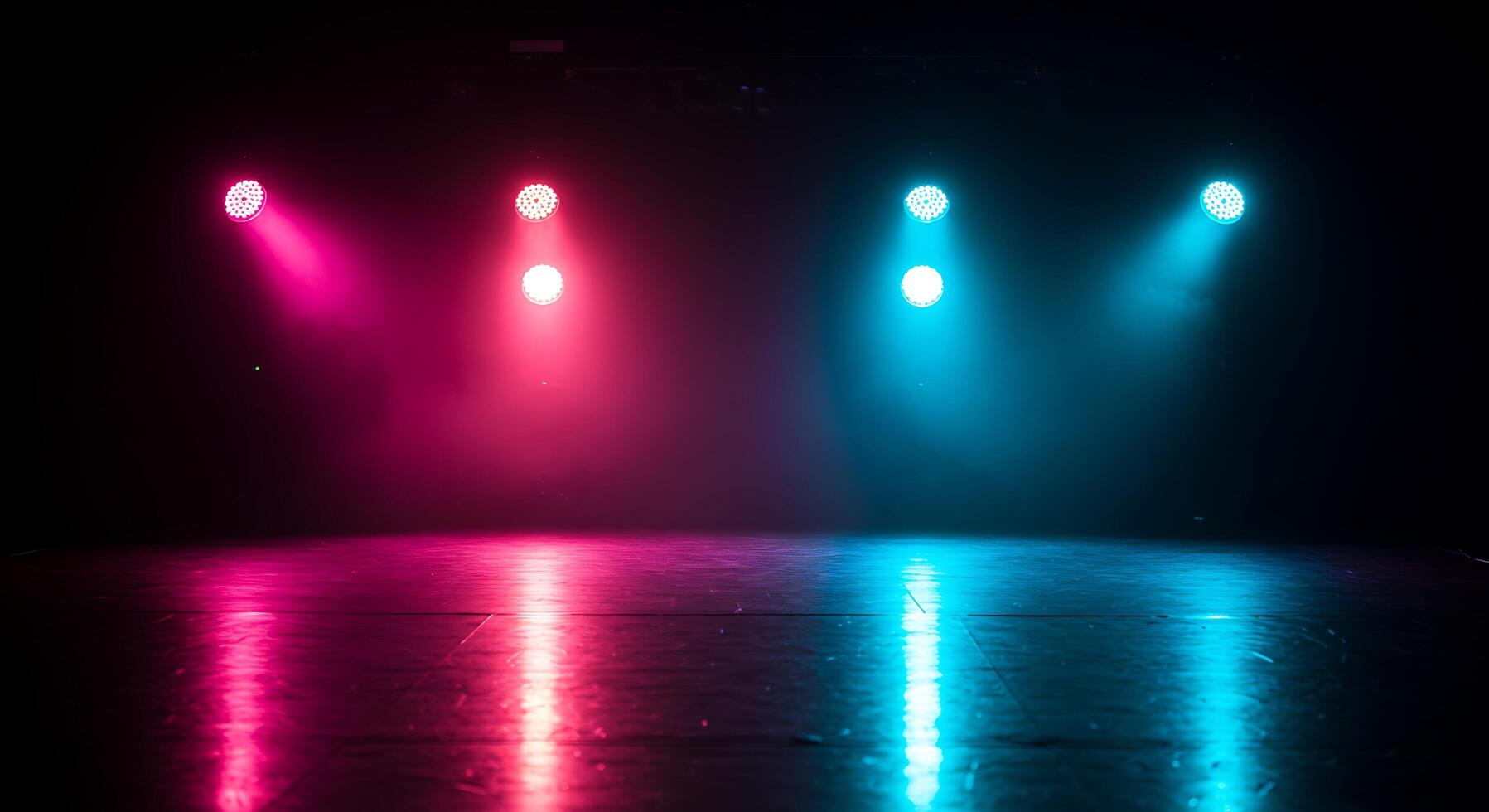 Three bright colored lights on a stage photo