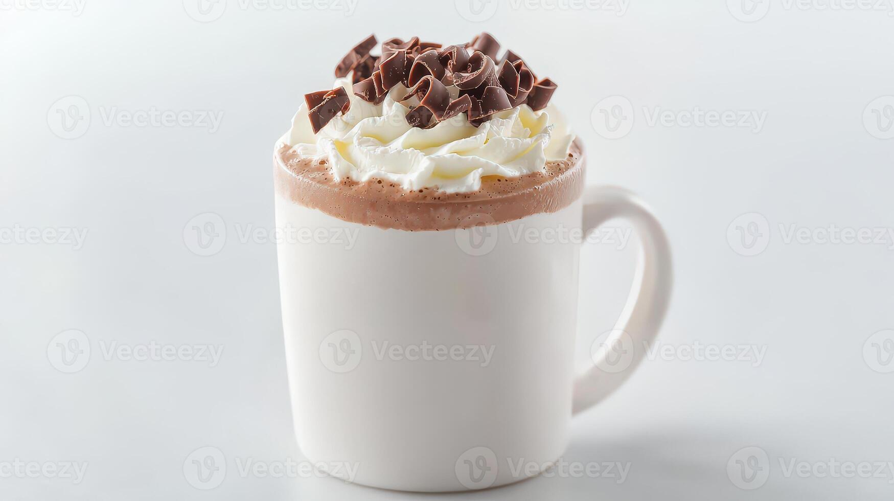 A white mug with whipped cream and chocolate chips photo