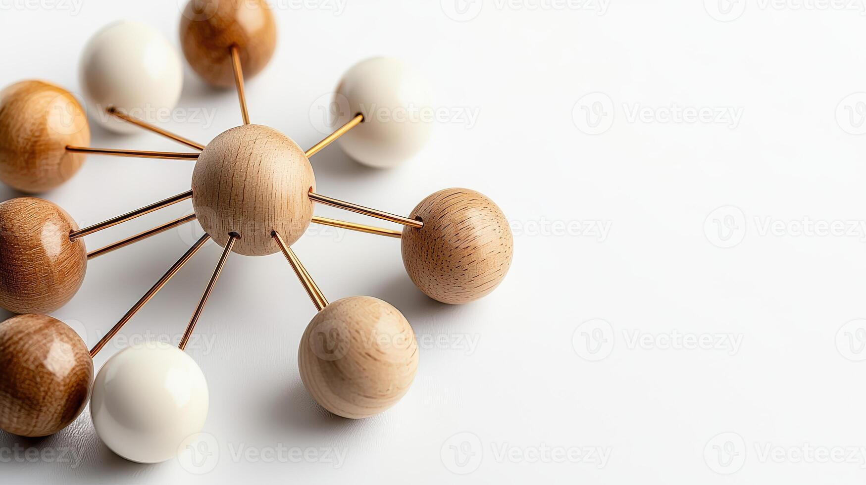 Wooden balls arranged in a circle on a white surface photo