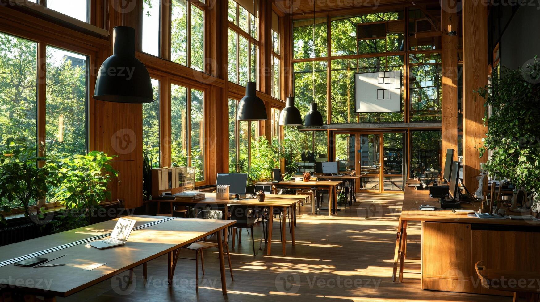 A large open office with lots of plants photo