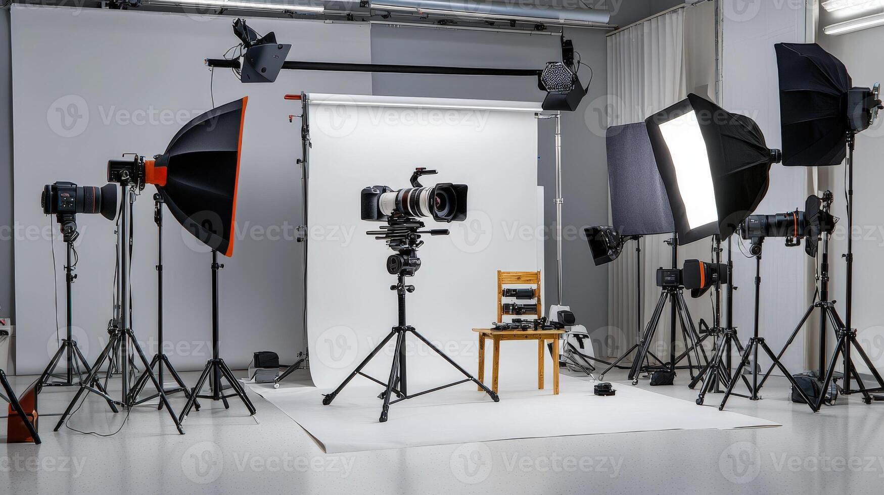A photo studio with lighting equipment and a chair
