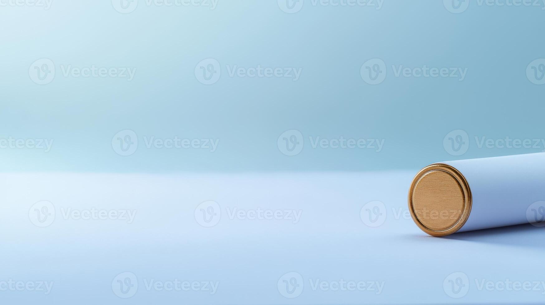A roll of paper is sitting on top of a blue surface photo