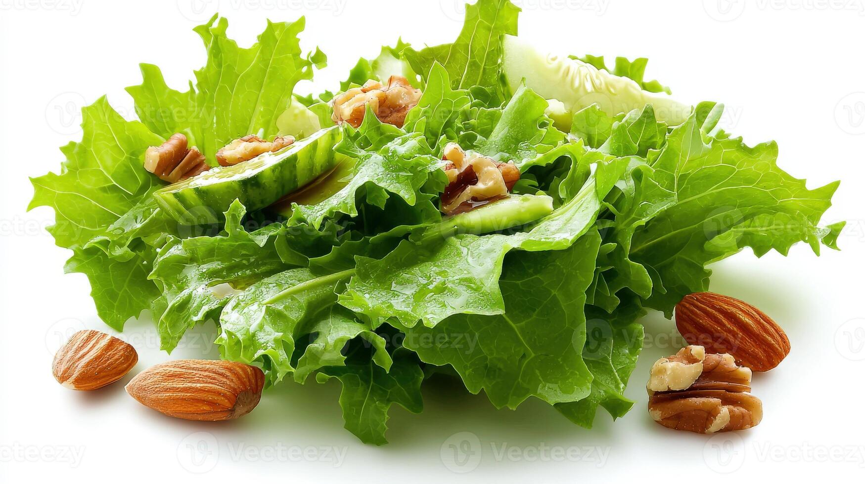 A salad with lettuce, walnuts and almonds photo
