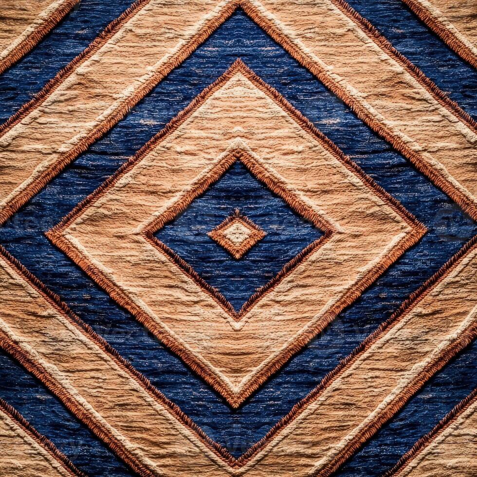 A blue and brown rug with a diamond pattern photo