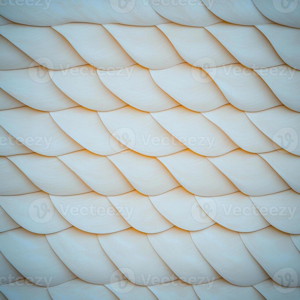 A white wall with a pattern of wavy lines photo