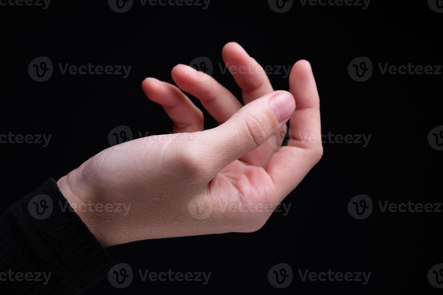 White empty hand of woman, female gesture. Hand holds half-open palm. Space women, one right hand close-up detailed photo