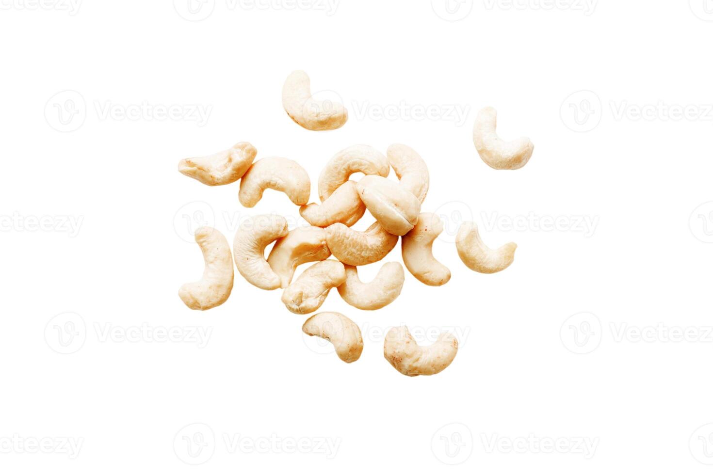 pile cashew nuts isolated on white background, top view. Flat lay Healthy food concept photo