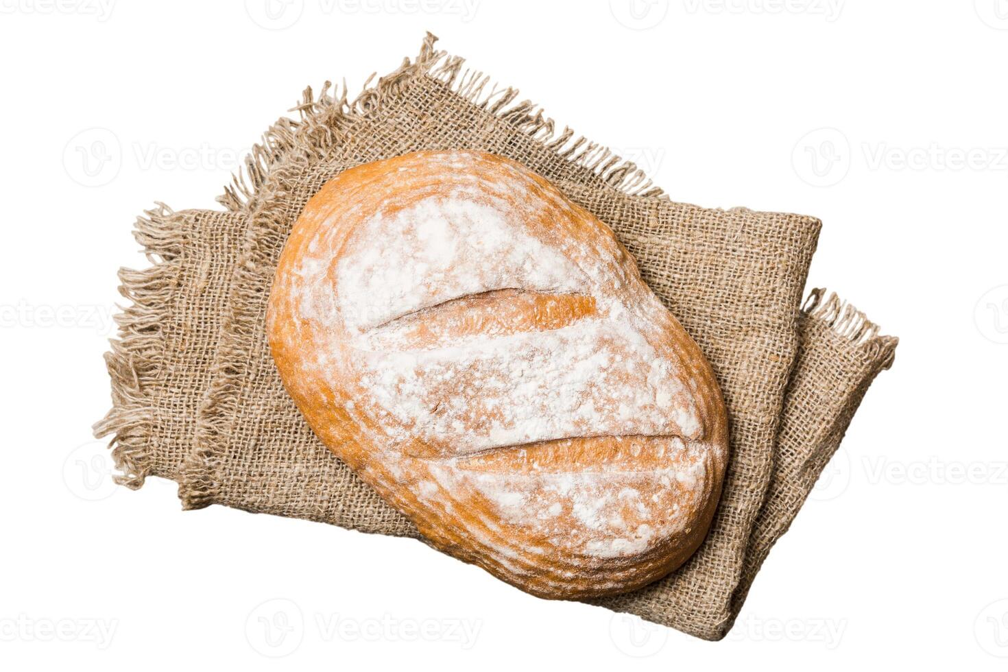 Fresh Homemade Whole Wheat Bread. bread on napkin isolated white background, photo