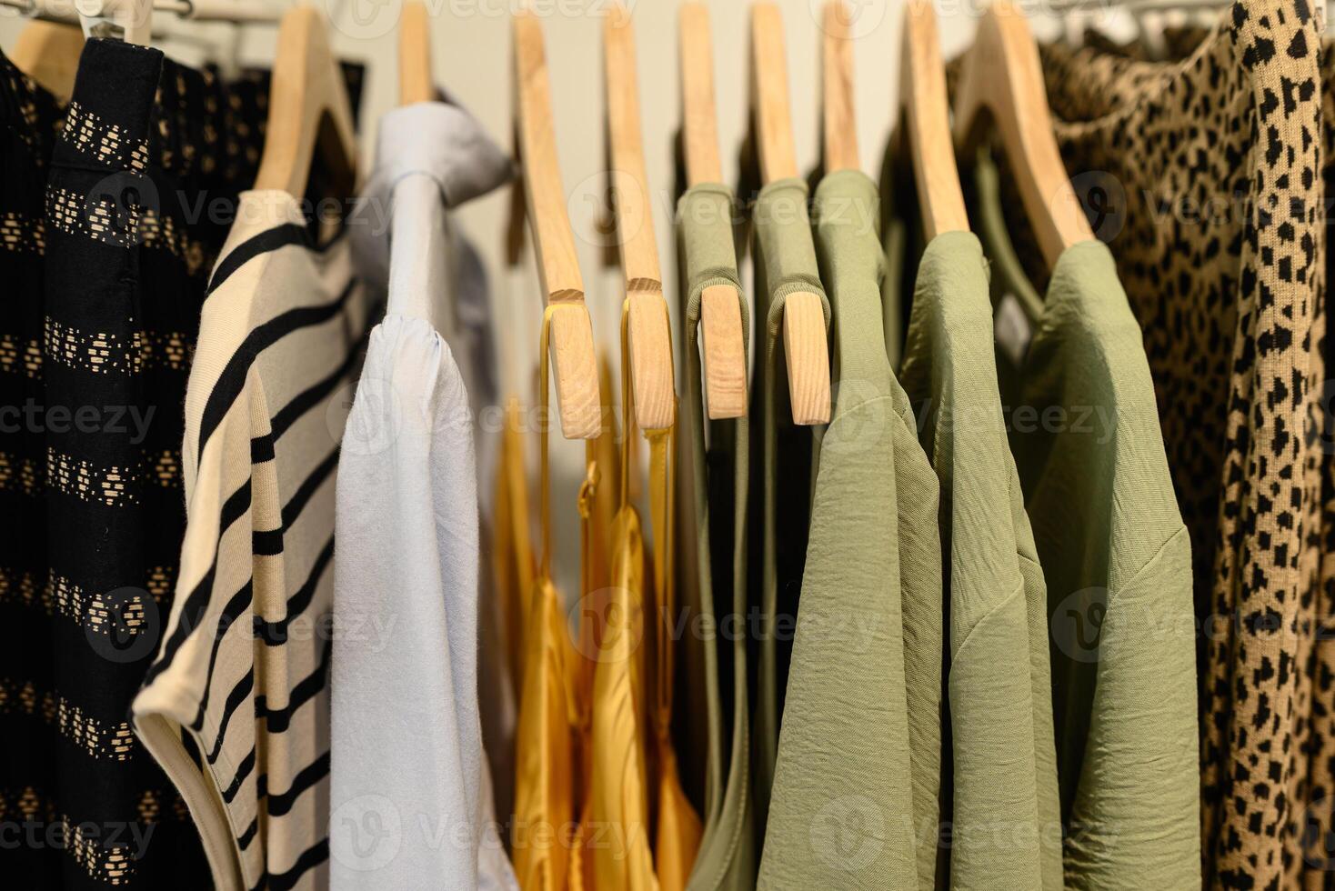 abstract pattern and texture of patterned clothing close view of patterned fabric texture on dresses hanging photo