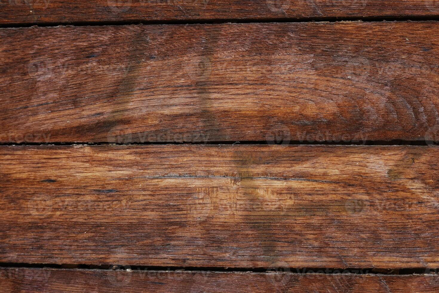 Wooden texture close up of rustic wooden surface showing grain patterns and natural imperfections photo