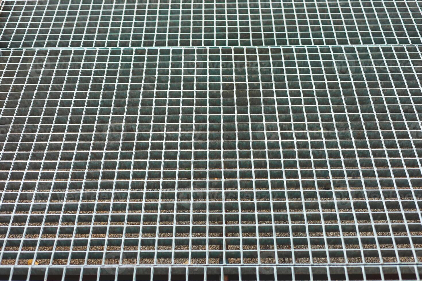 Grid structure on a flat surface shows even spacing and neat alignment in a workshop setting photo