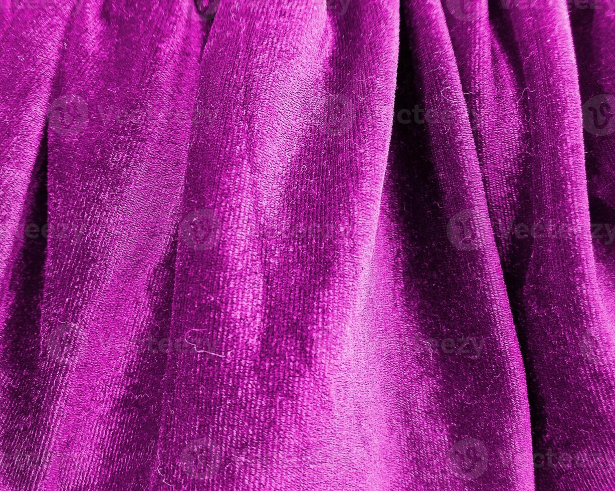 Velvet Curtain Hanging on window closup view photo