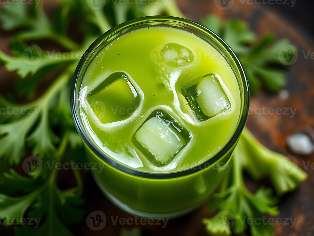 Refreshing Green Celery Juice with Ice Cubes photo