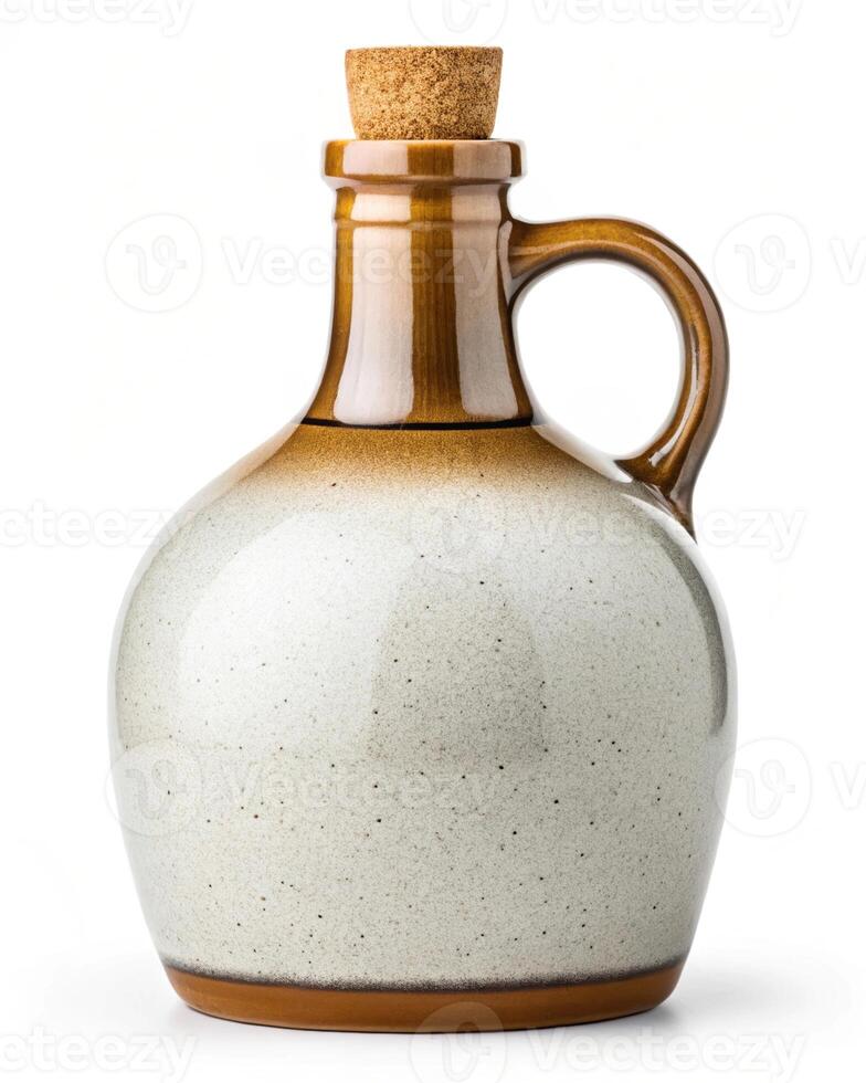 A white and brown jug with a cork stopper photo