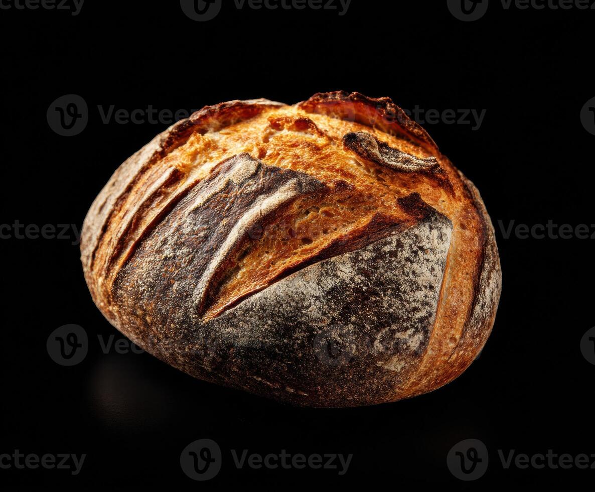 Artisanal crusty bread loaf on dark surface for culinary use photo