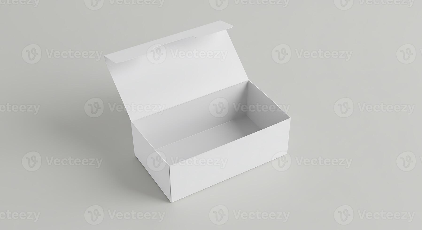 White box with lid open on a plain surface photo