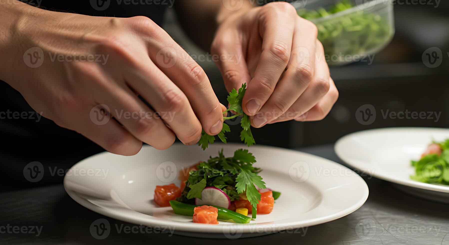 A person is cutting vegetables on a plate photo