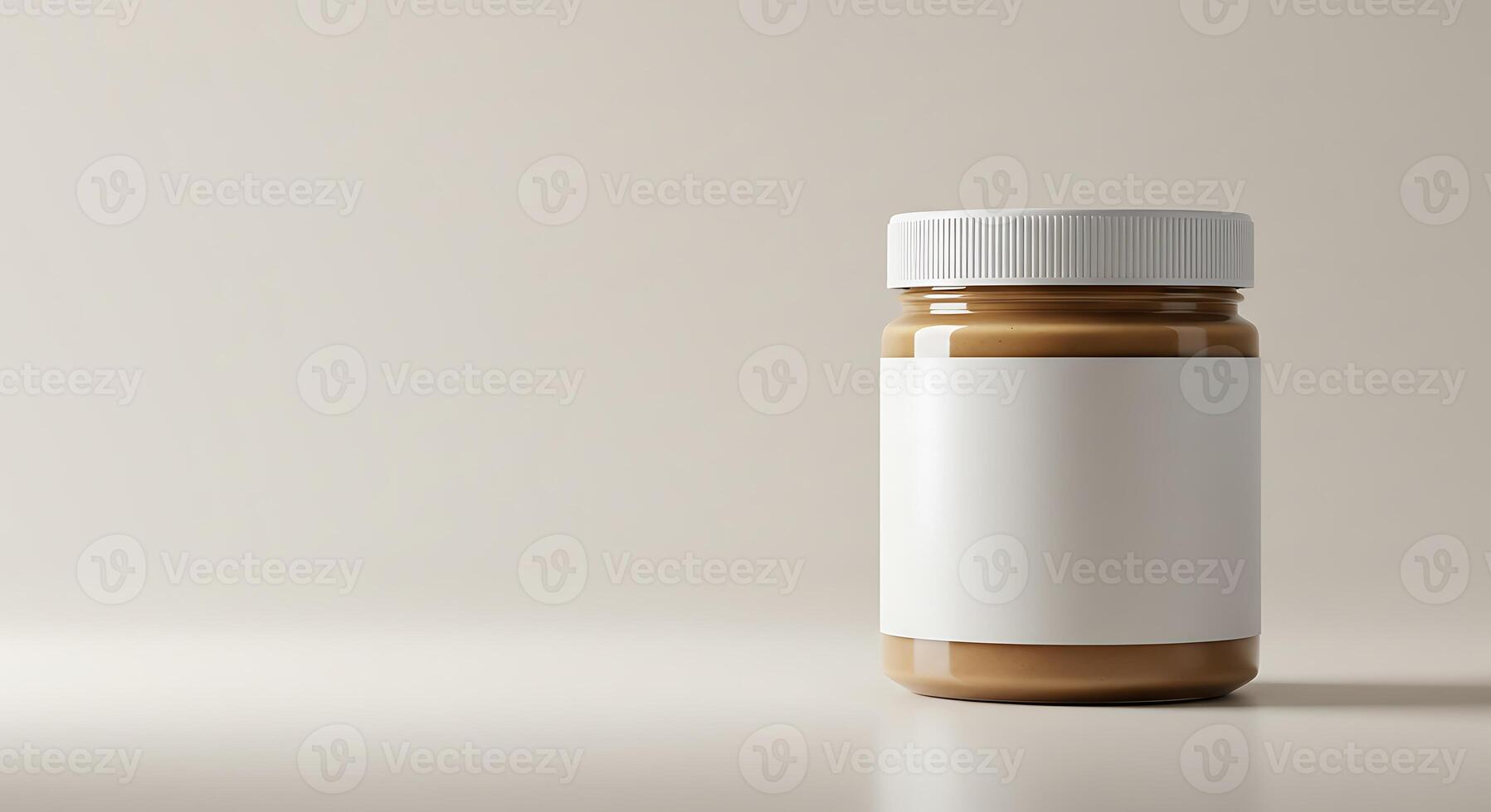 A jar of peanut butter on a table photo