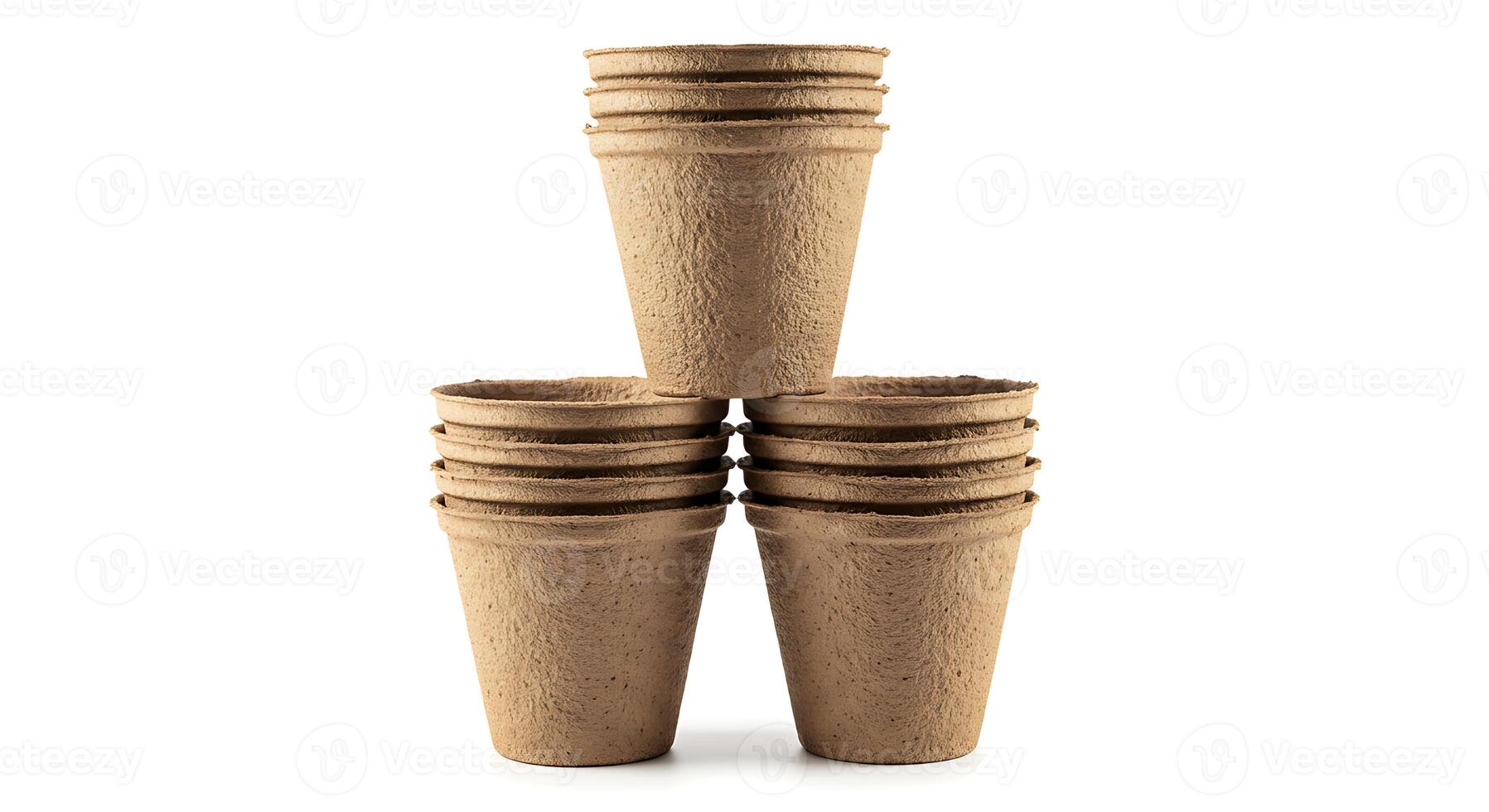 A stack of four brown paper cups photo