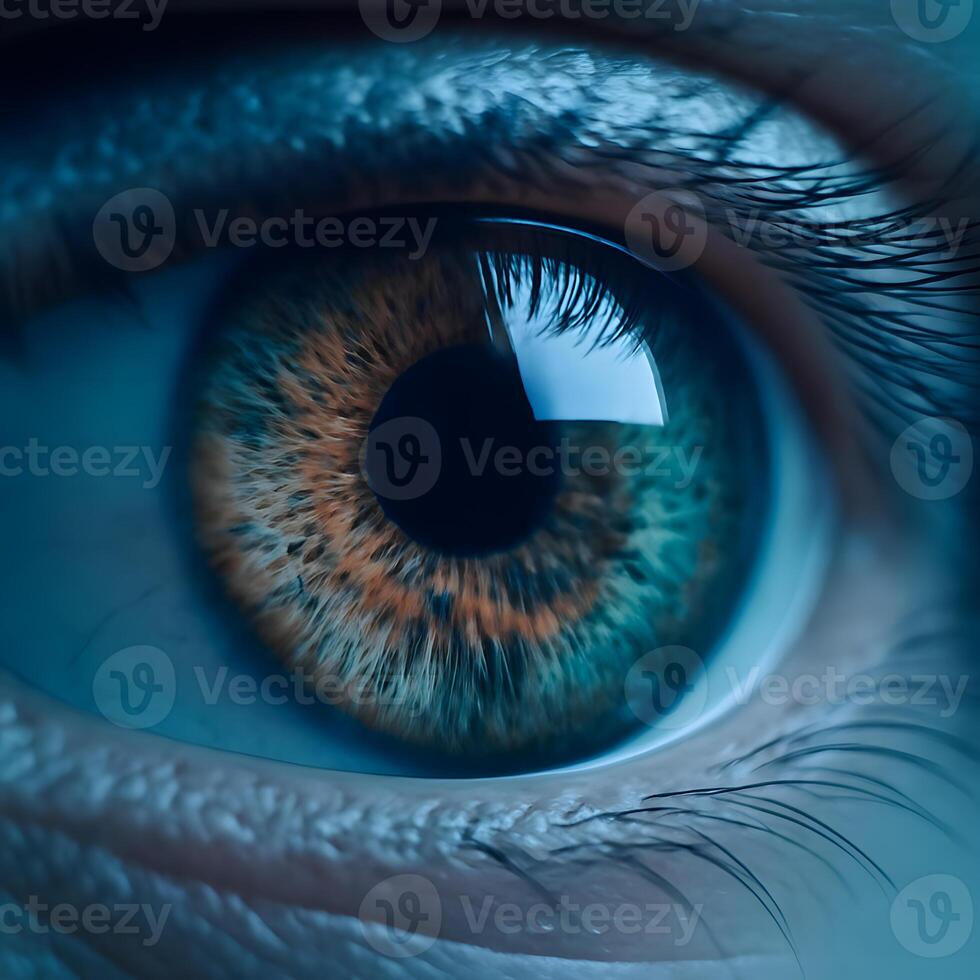 A detailed close-up shows a human eye with intricate textures and colors in the iris and reflected light photo