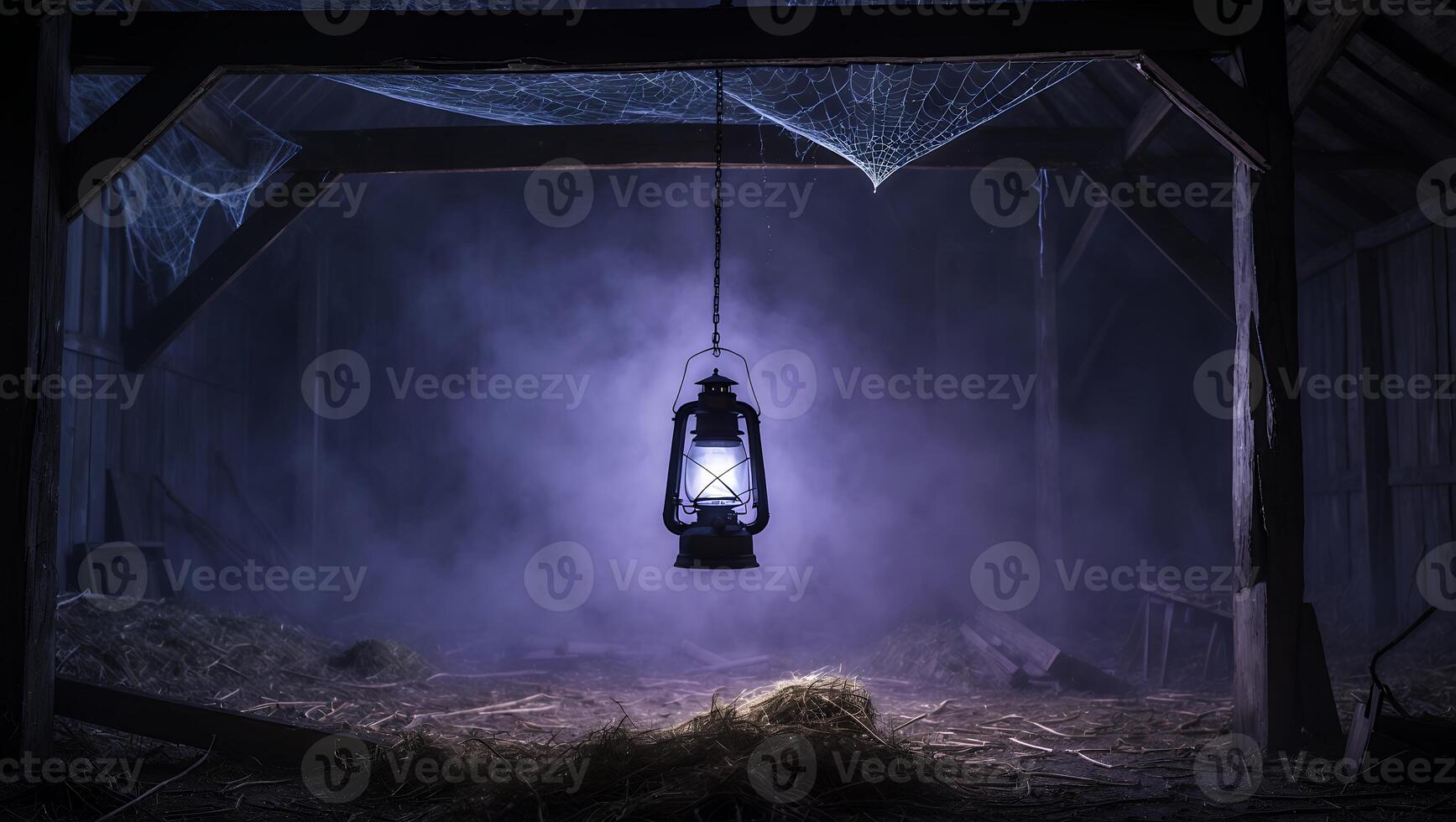 Lantern Inside Creepy Barn with Spiderweb and Fog photo