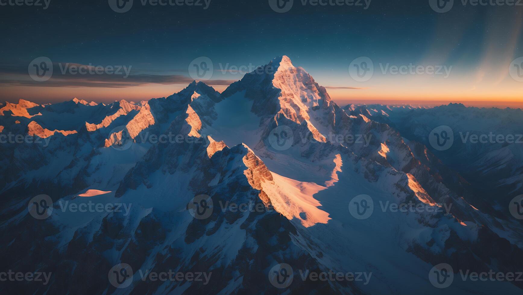 Snowy Mountain Peak at Sunrise photo