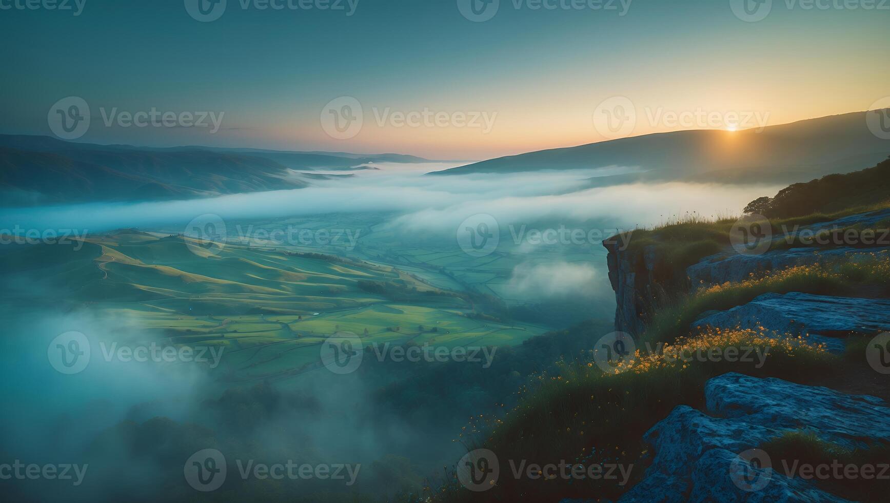 Landscape View of Valley From Cliff with Fog During Sunrise photo