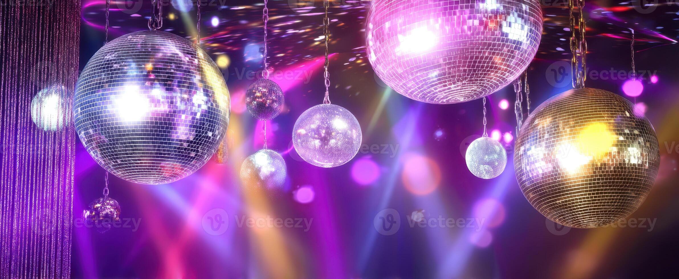 The shimmering disco balls creating an energetic atmosphere for vibrant celebrations. photo
